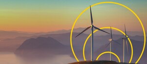 Photo of three wind turbines on a hill with an outline of the Achieving net-zero emissions graph