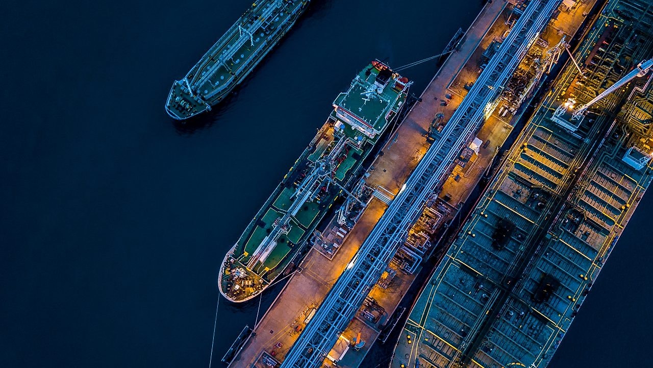 A cargo ship docked from a bird’s-eye view