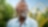 Smiling man with a beard in front of trees with an outline of the Generating shareholder value graph