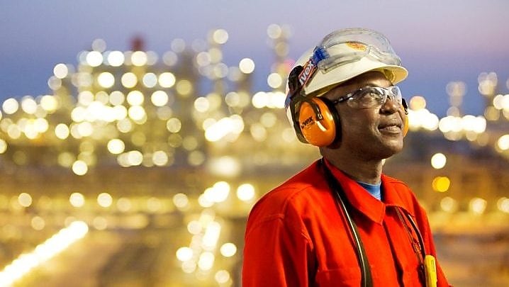 Employee in safety uniform at Pearl GTL